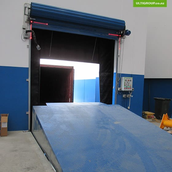 Container Dock Leveler: allows the trailer to park underneath the platform allowing easy forklift access