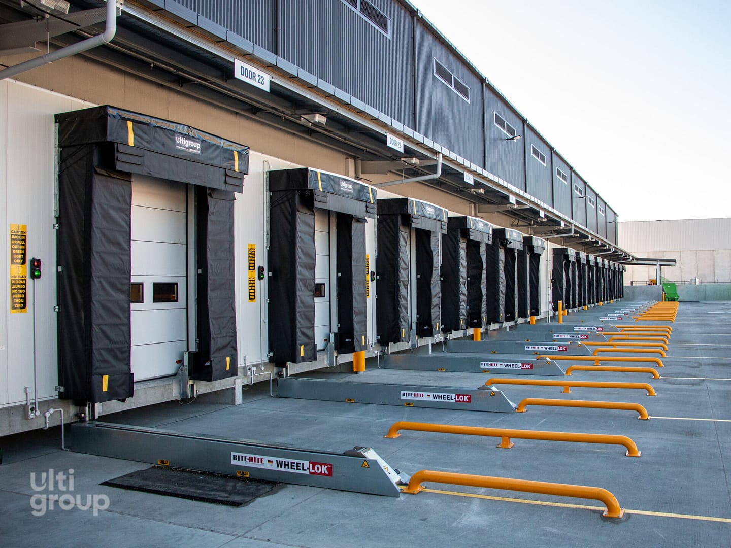 Rite-Hite Wheel-Lok vehicle restraints and dock seals at a multi-bay loading dock.