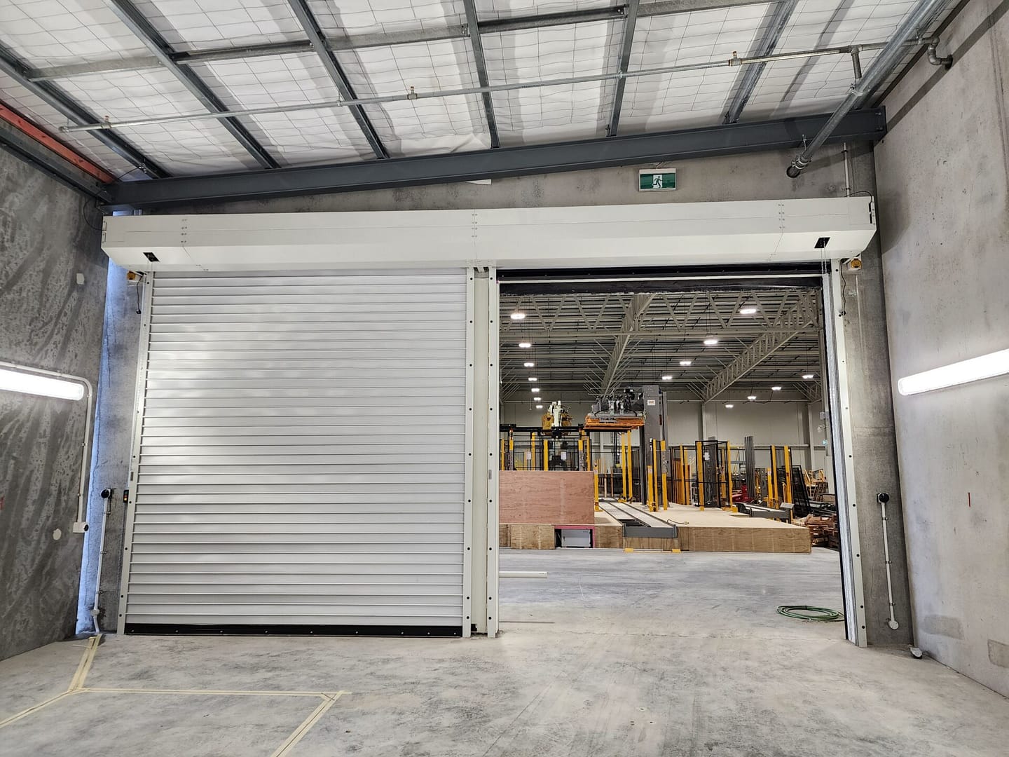 Ulti Spiral Door installed in a large industrial warehouse facility.