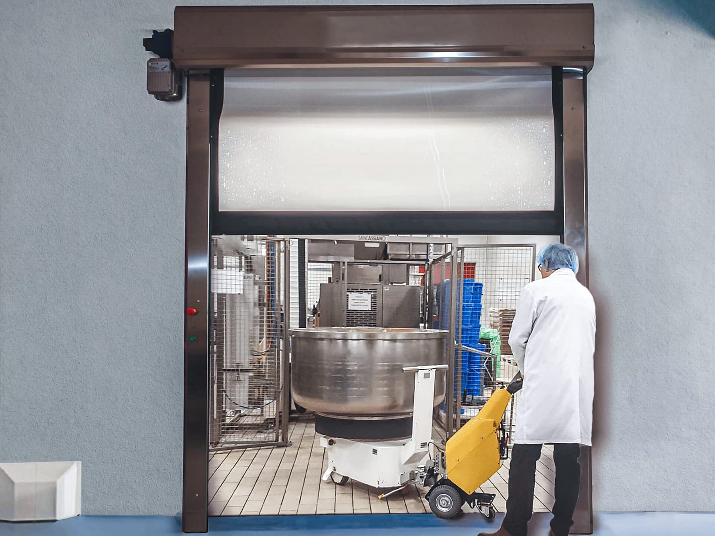 A high-speed Ulti-Roll Clean door installed in a food processing facility.