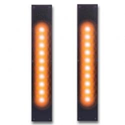 Vertical LED safety light strips for industrial door traffic management.