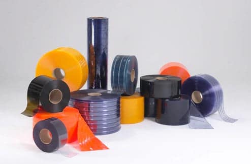 Assorted rolls of industrial PVC strip curtain material in various colours.