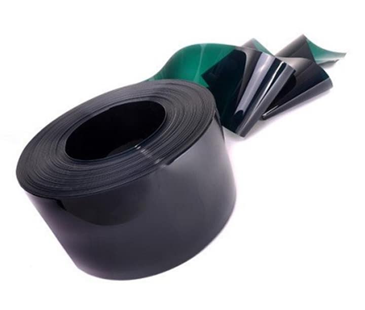 Roll of dark green translucent welding PVC strip.