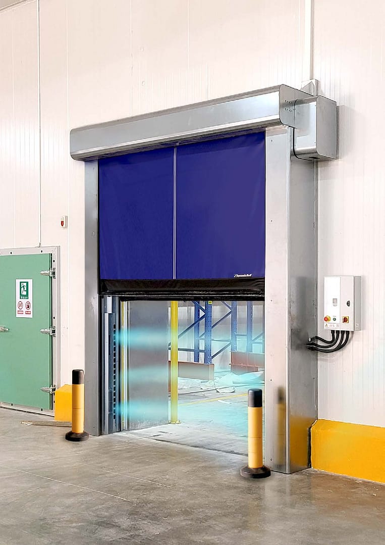 Blue high-speed insulated door with air curtain technology in a cold storage facility.