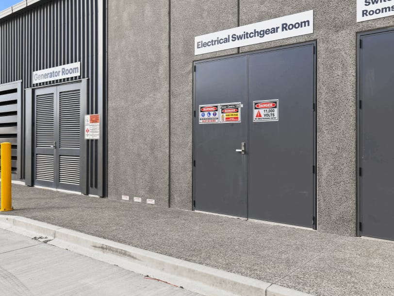 Industrial steel doors for generator and electrical switchgear rooms.