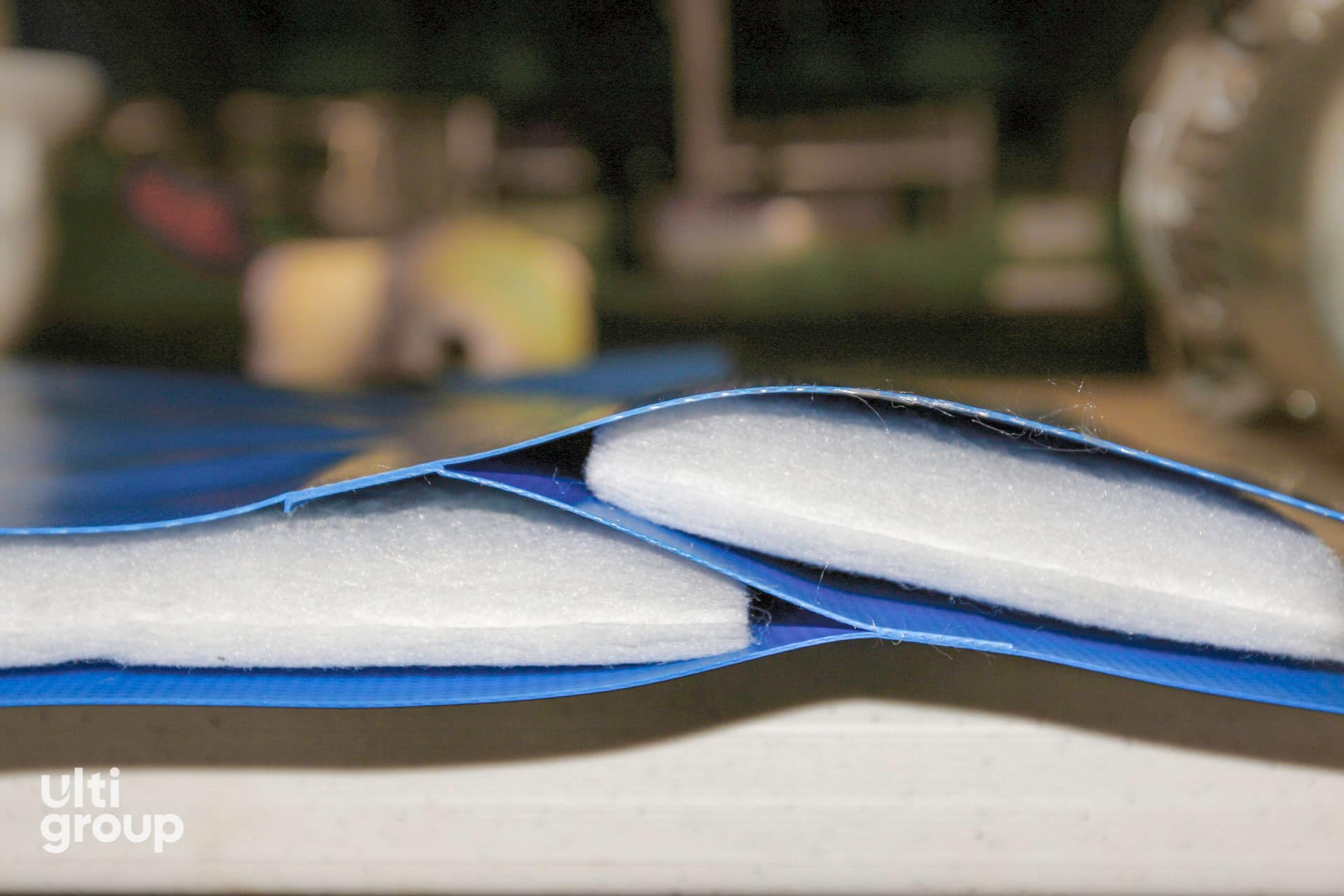 Cross-section of Fastrax FR Door insulated fabric showing internal padding.