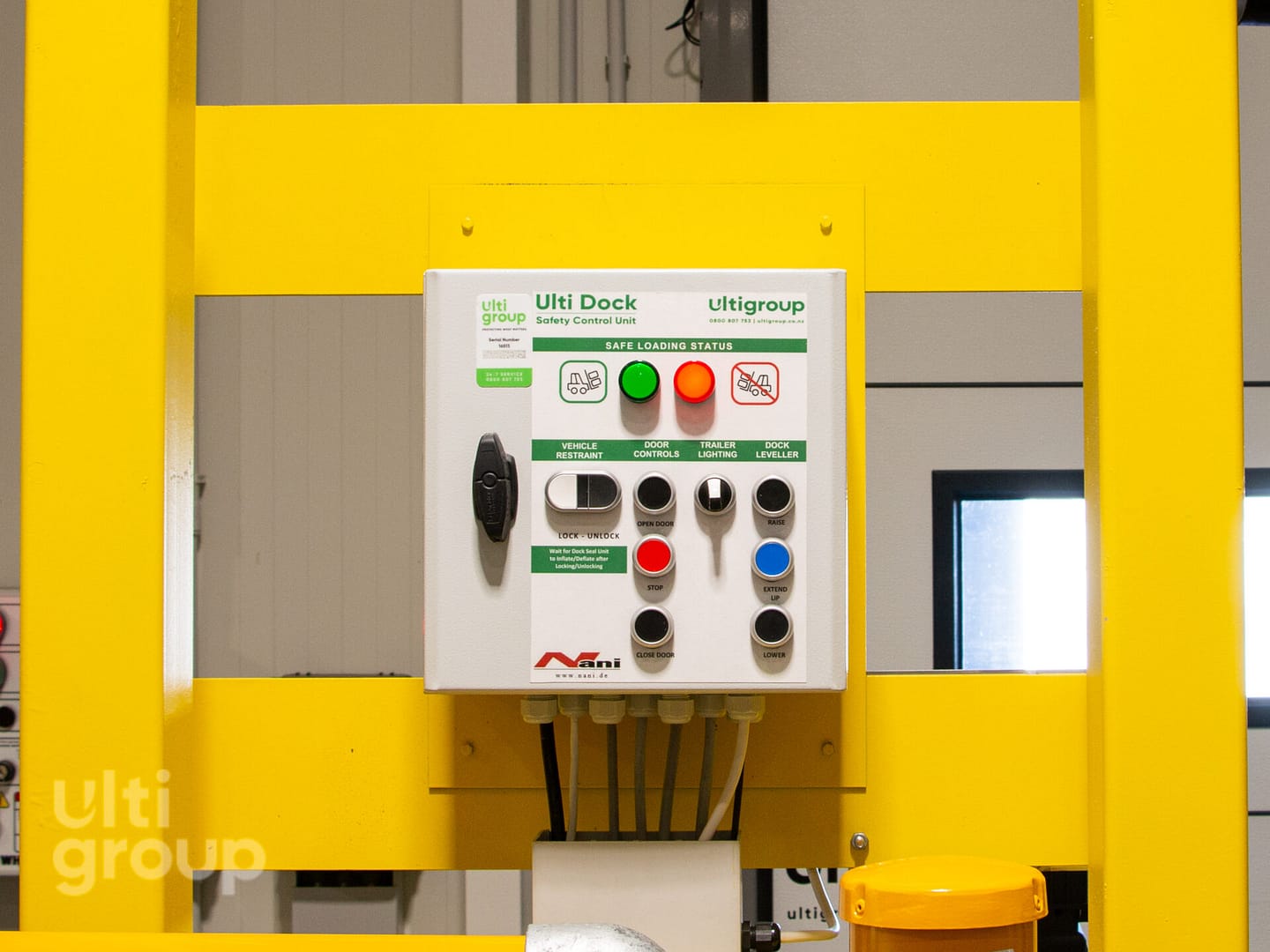 Ulti Dock Safety Control Unit mounted on a yellow steel frame.