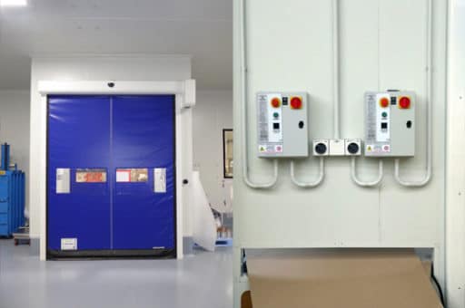 Blue high-speed industrial door and wall-mounted control panels.