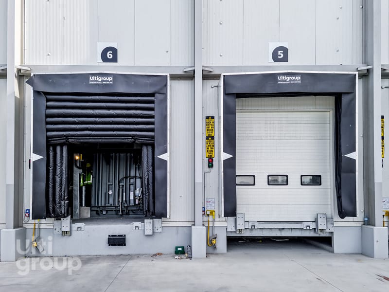 Two loading docks with inflatable seals and a Vertical Storing Dock Leveller.