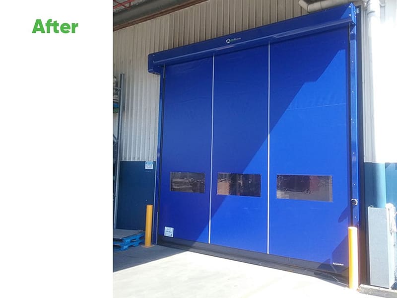 Blue Ulti Fold Door installed at an industrial warehouse entrance.