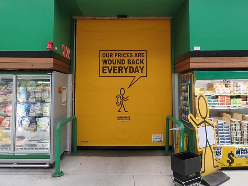 Yellow Ulti-Roll high speed door with custom Pak'nSave branding.